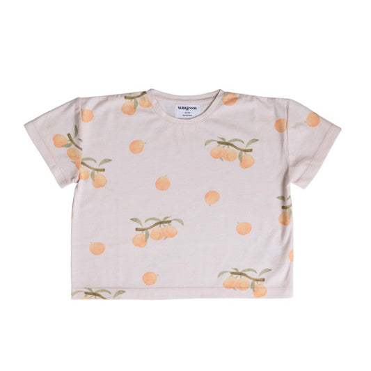 Beige t-shirt with apricot fruit pattern on a white background