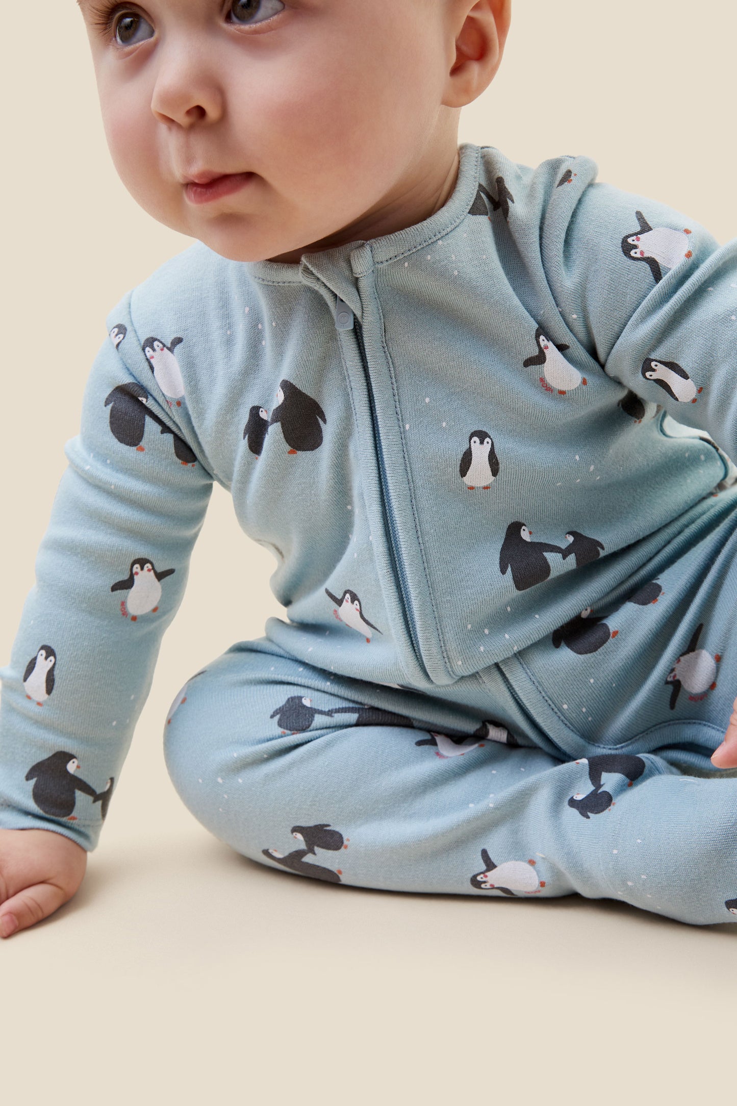 Penguin print double zip sleepsuit
