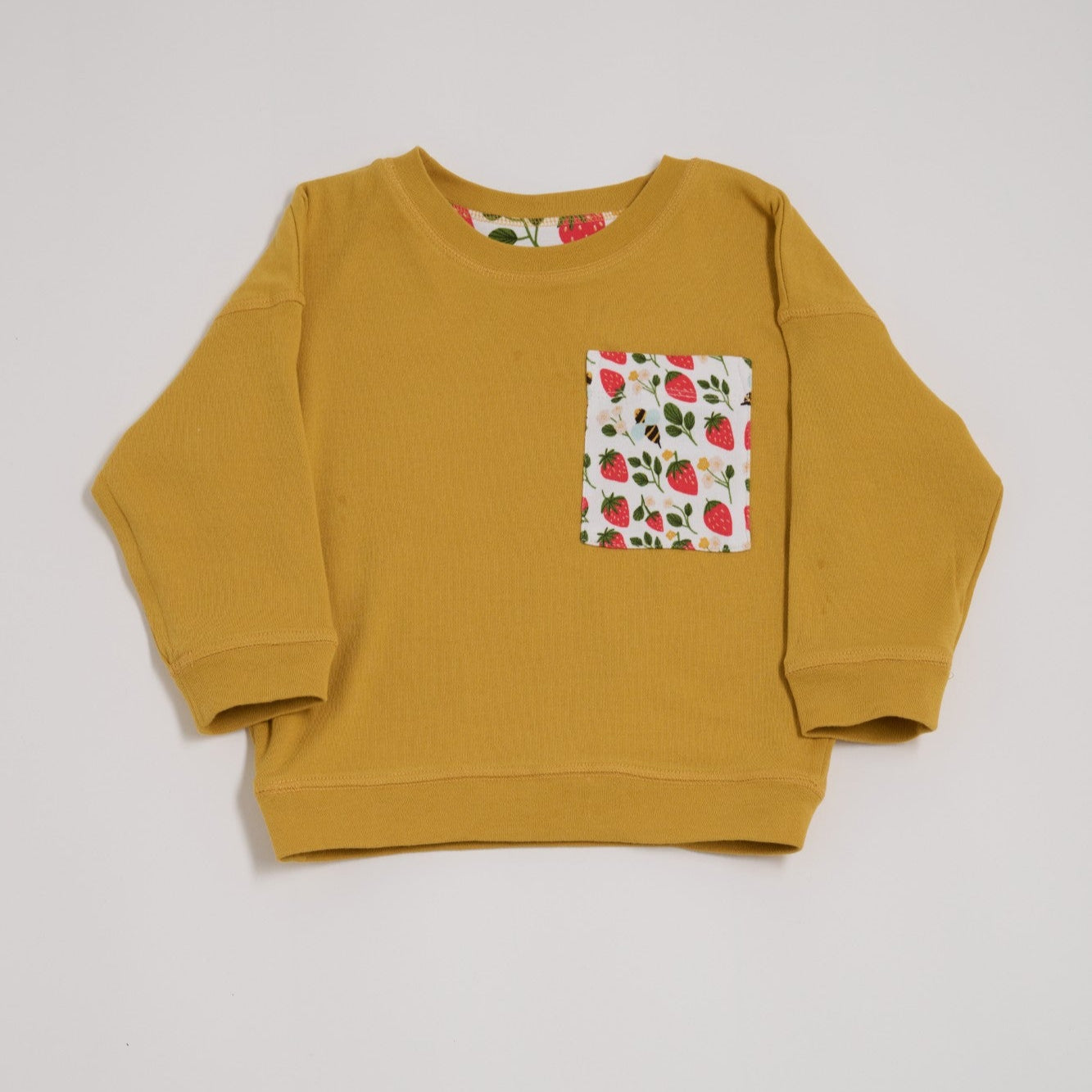 Strawberry fields honey reversible sweatshirt