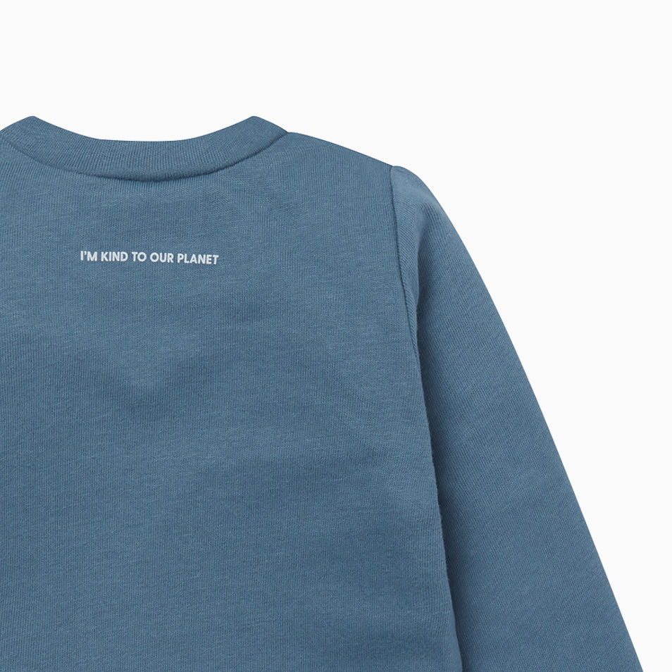 Back of long sleeve t-shirt in blue with slogan