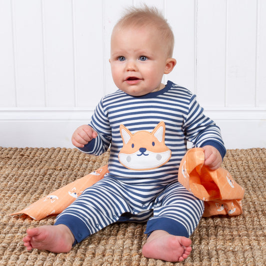 Baby wearing foxy romper