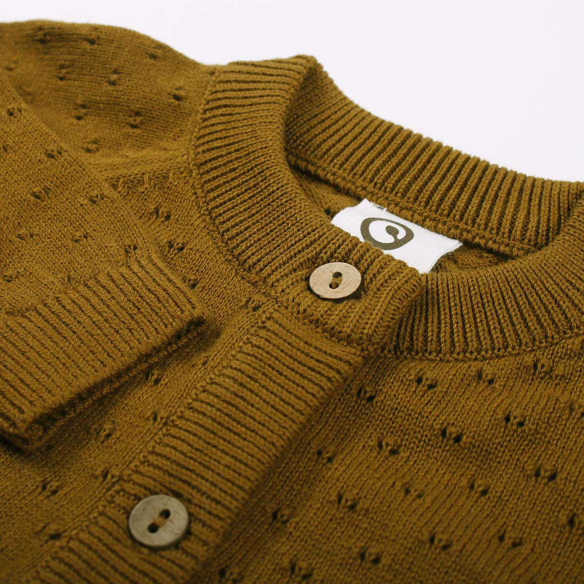 Knit cardigan - nut detail
