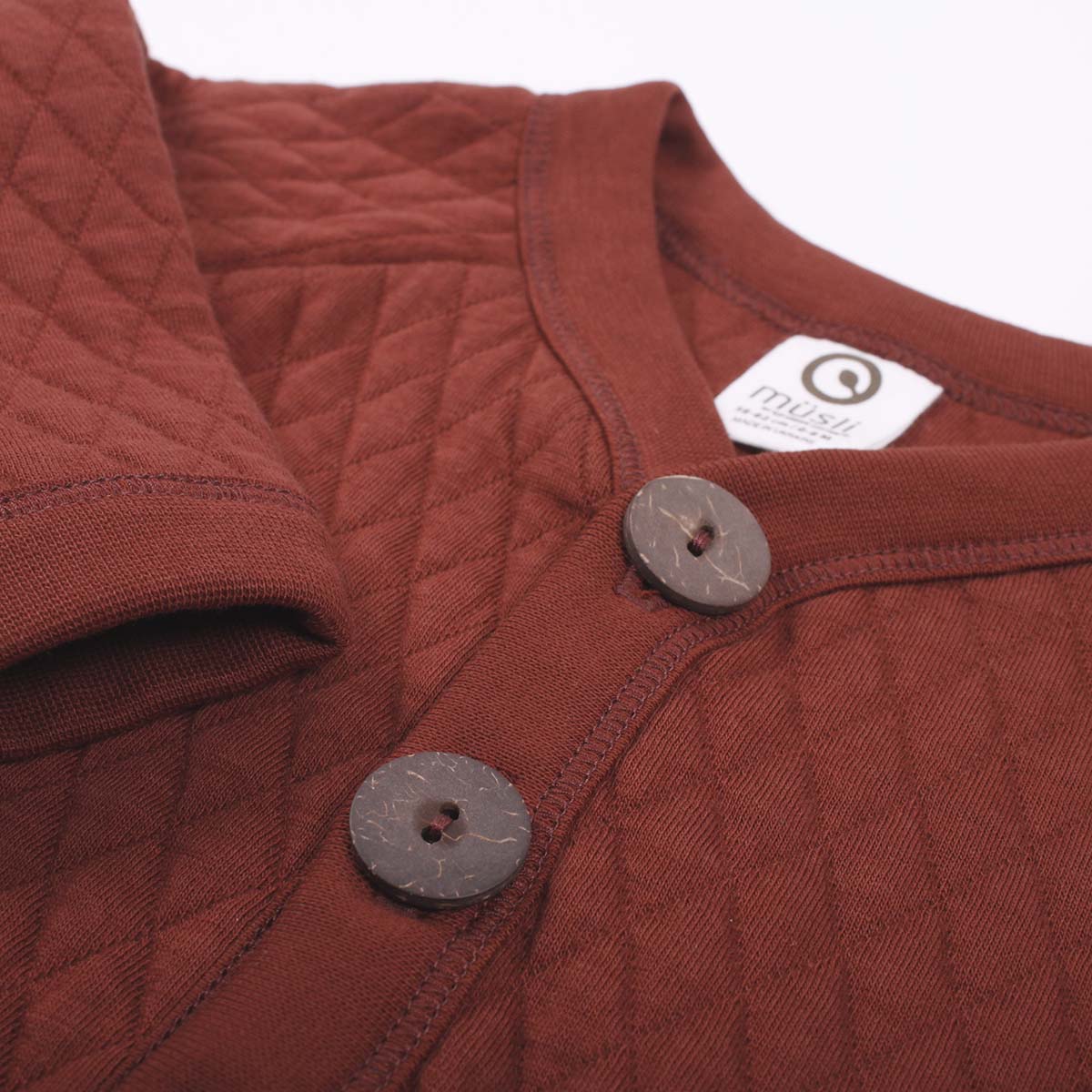 Quilt jacket buttons detail 