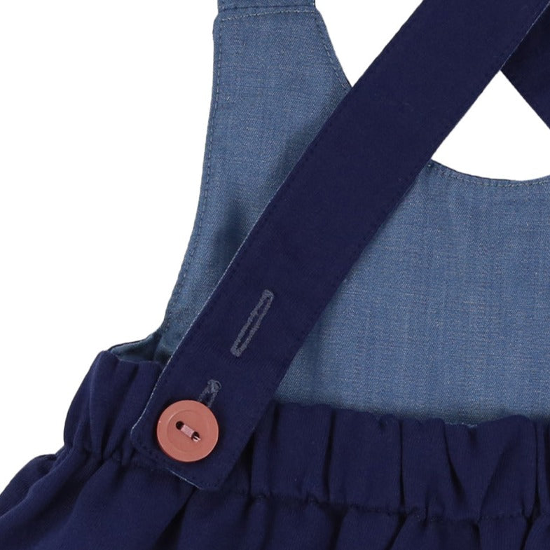 Reversible character pinafore adjustable straps