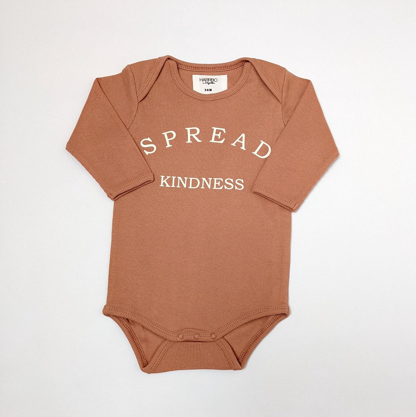 Spread kindness baby bodysuit in clay