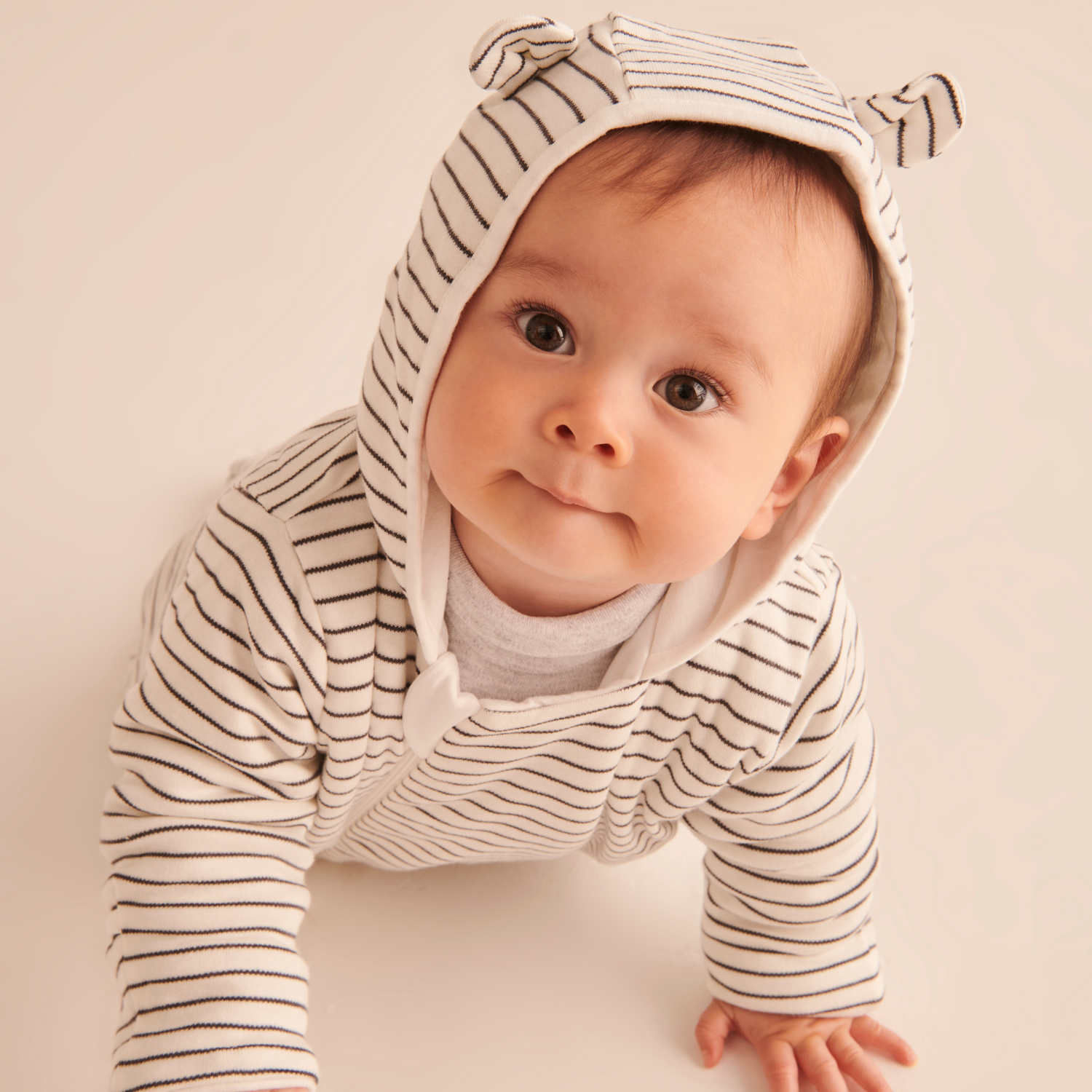 Grey stripe pramsuit baby crawling